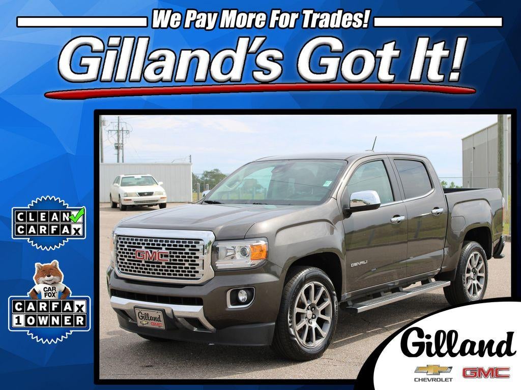 2019 GMC Canyon 4WD Denali in Smokey Quartz Metallic — front three-quarter view